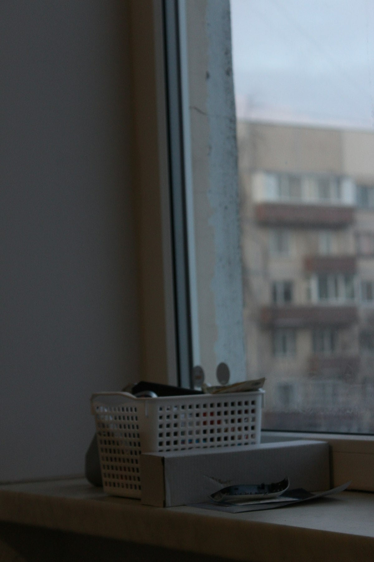 Under-bed storage box with lid, styled bedroom view