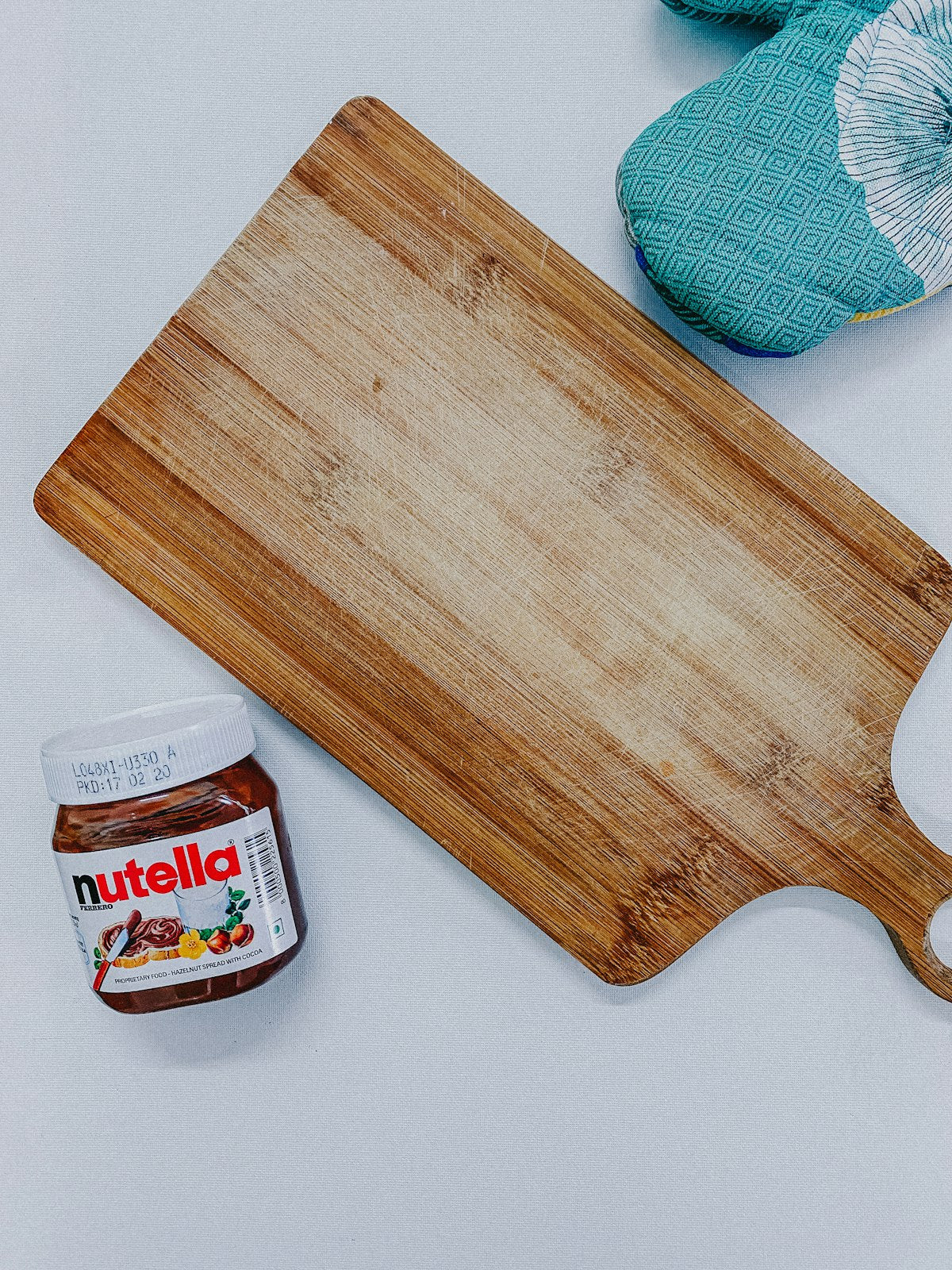 Acacia wood serving board, styled view