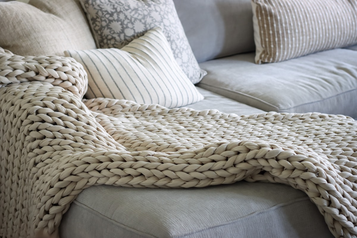 Mustard tassel trim cushion