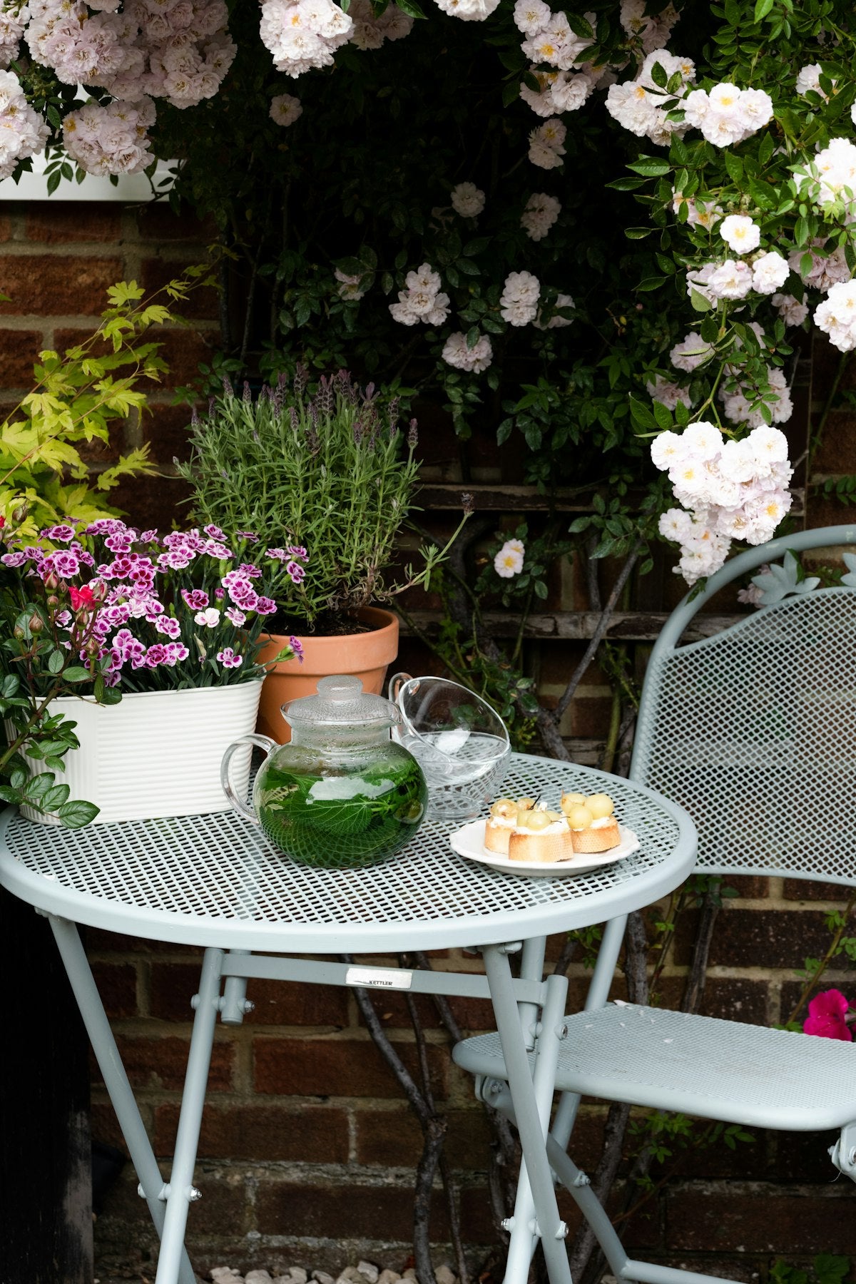 Folding outdoor bistro table, angle view