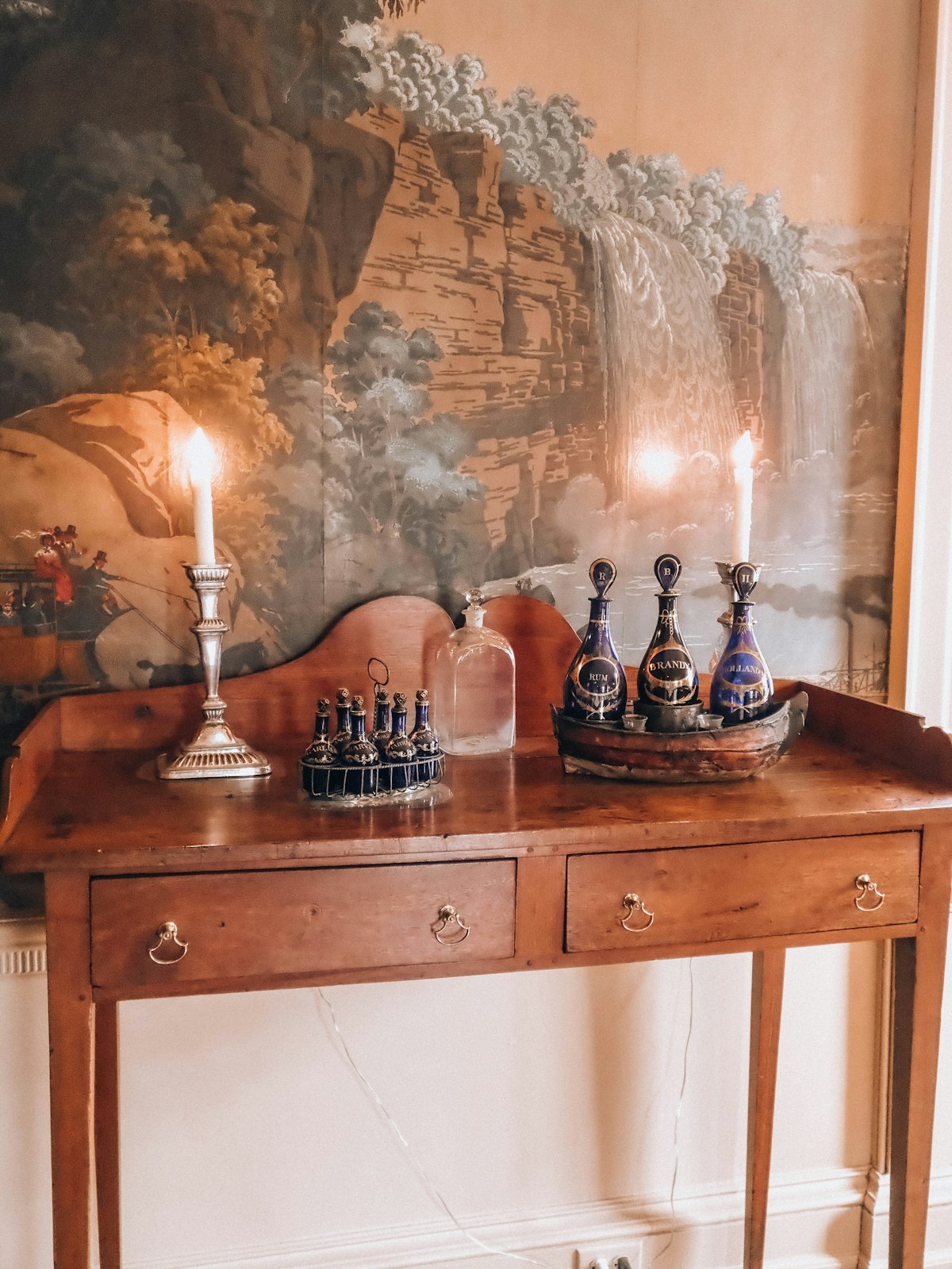 Console table with drawer, styled hallway view